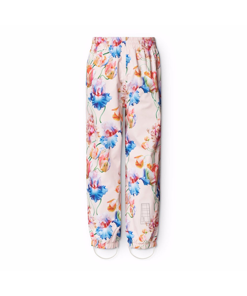 Waits - Tulip Pink - Hellblaue wind- und wasserdichte Regenhosen für Kinder aus strapazierfähigem und recyceltem Polyester.