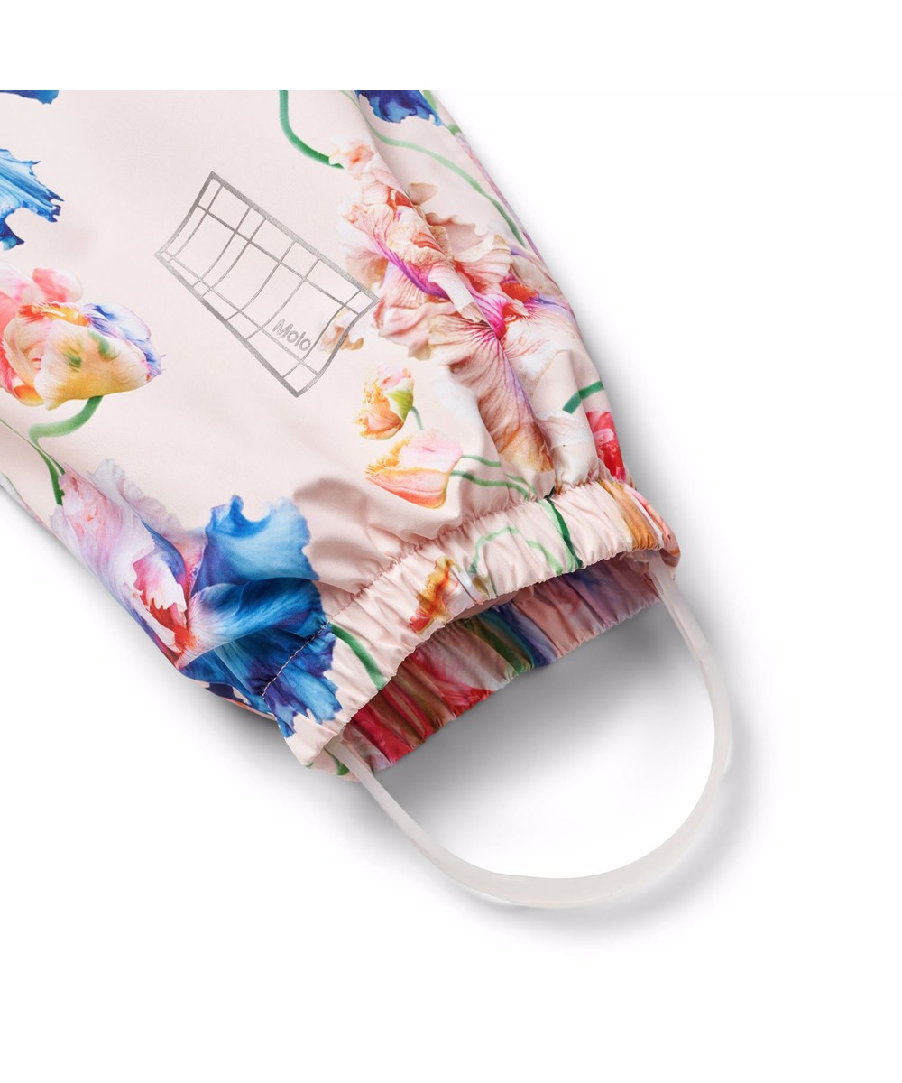 Waits - Tulip Pink - Hellblaue wind- und wasserdichte Regenhosen für Kinder aus strapazierfähigem und recyceltem Polyester.