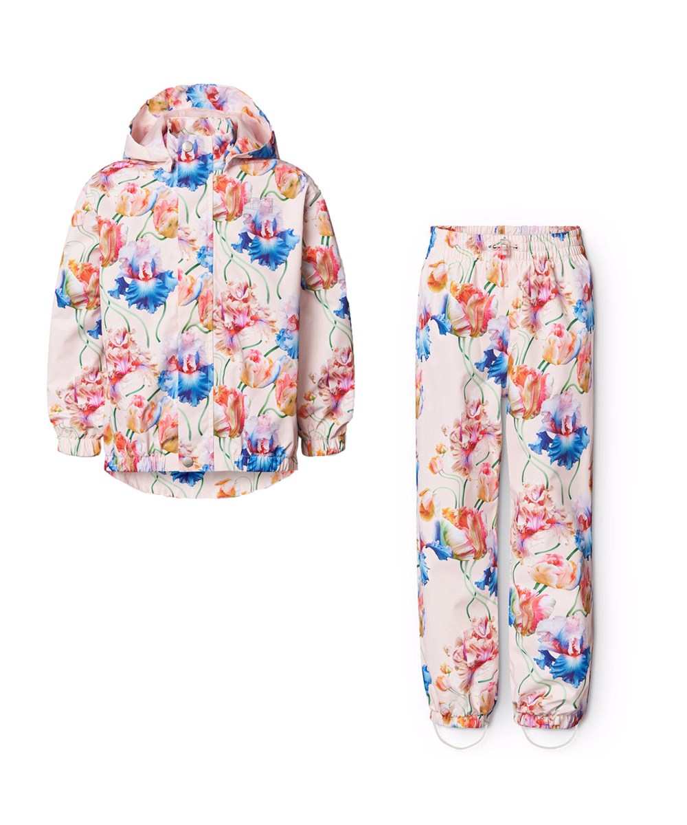 Whalley - Tulip Pink - Pinkfarbenes wind- und wasserdichtes Regenset aus recyceltem Polyester mit einem Allover-Druck von künstlerischen Tulpen.