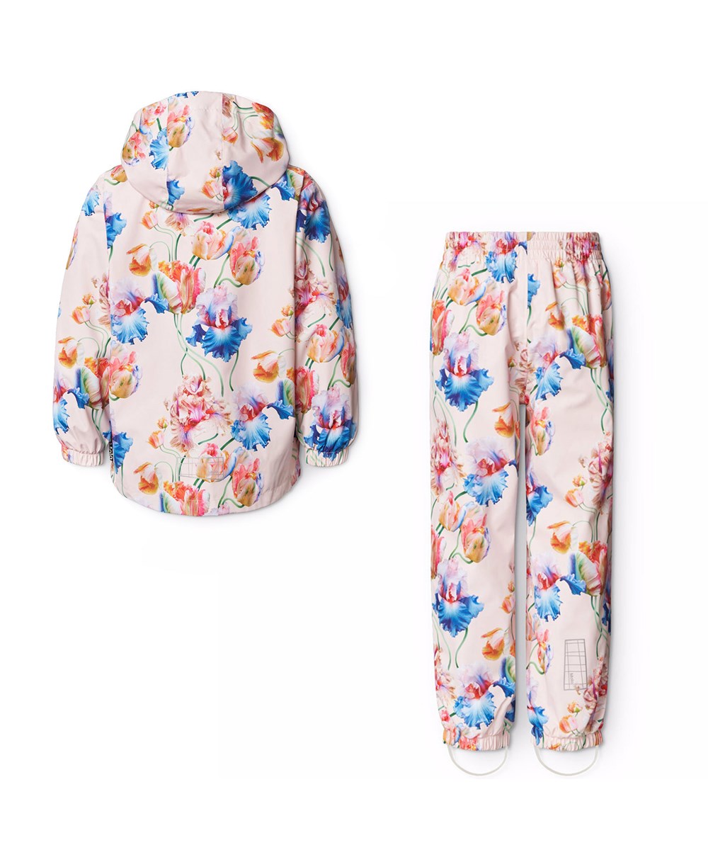 Whalley - Tulip Pink - Pinkfarbenes wind- und wasserdichtes Regenset aus recyceltem Polyester mit einem Allover-Druck von künstlerischen Tulpen.