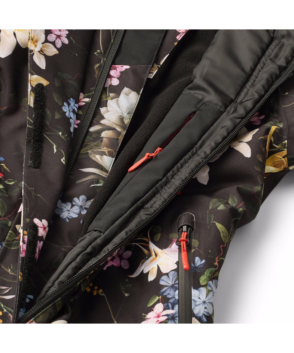 Hux - Paisley Flowers - Wind- und wasserdichter Schneeanzug mit farbenfrohem Blumendruck für einen kalten Winter oder Skiurlaub aus recyceltem Polyester und gefüttert mit 3M™ Thinsulate™.
