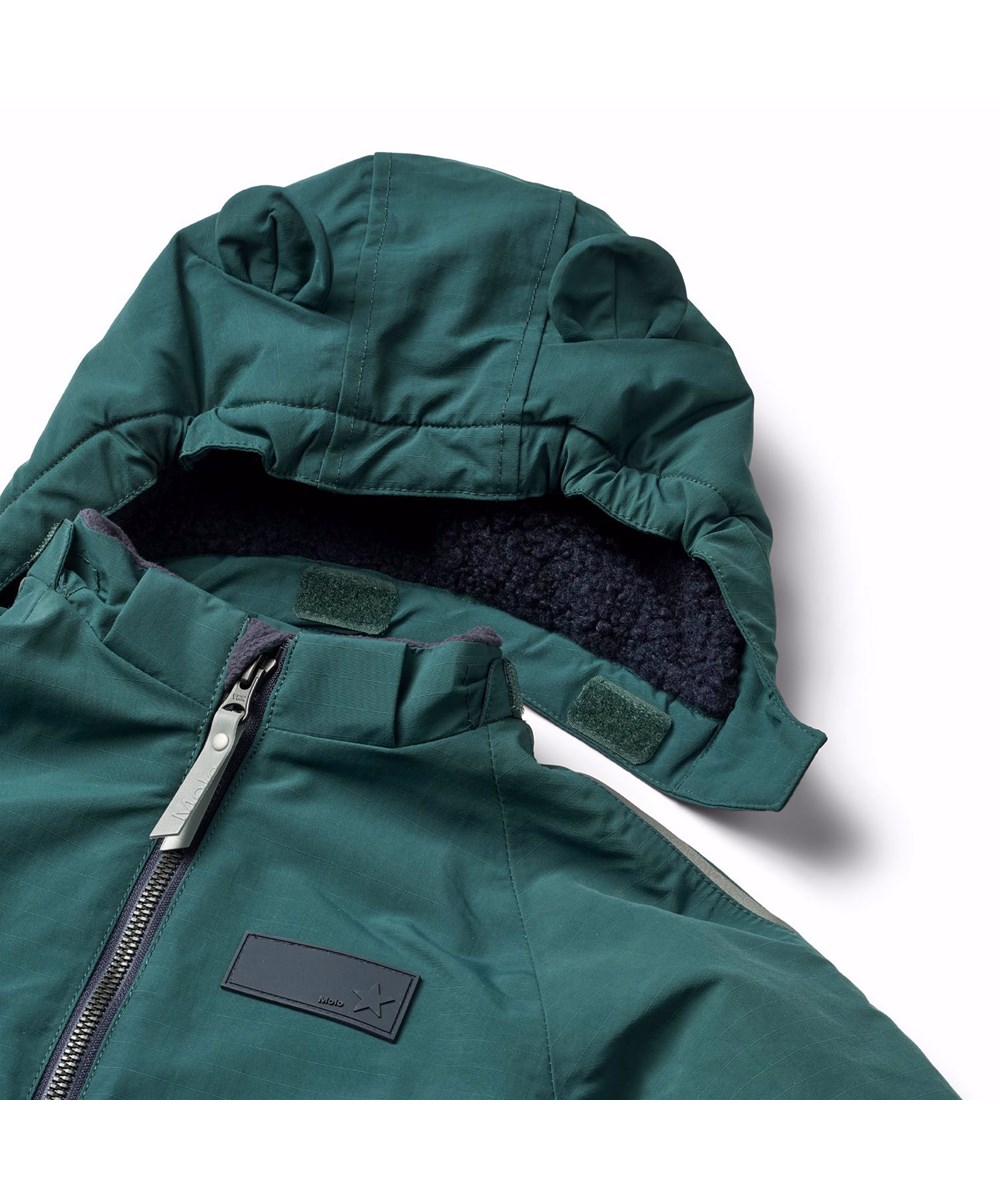 Hyde - Ponderosa Pine - Dunkelgrüner warmer Schneeanzug für Babys und Kleinkinder aus recyceltem Polyester.