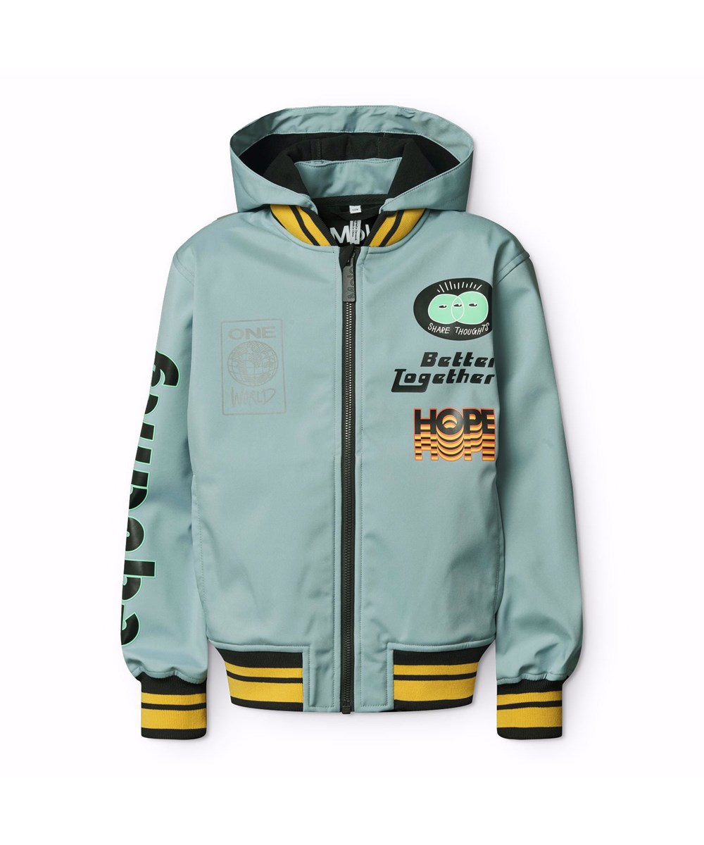 Cloudy - Misty Blue - Blue wind and water-resistant softshell jacket for children in recycled polyester, featuring small prints of positive statements and messages from the collection's themes.