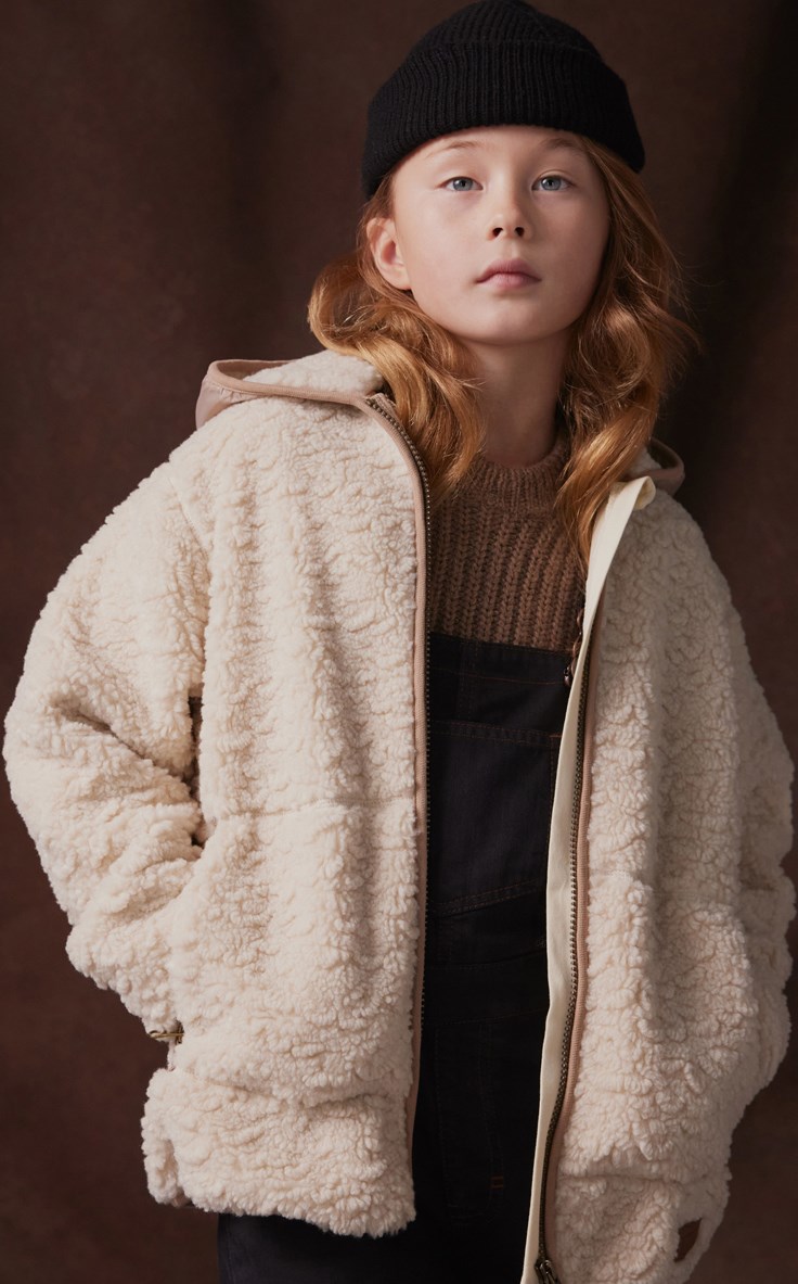 Uberto - White Noise - Off-white and pink fleece jacket for children with a front zipper, hood, and large front pockets.