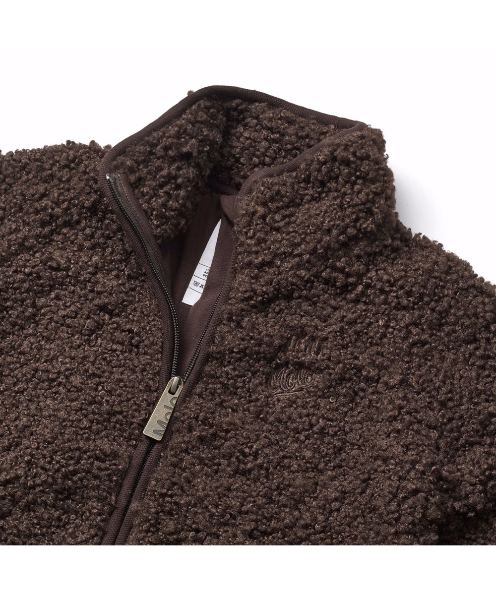 Ulan - Dark Cocoa - Dark brown fleece jacket for children made of recycled polyester with a nice back patch in durable nylon.
