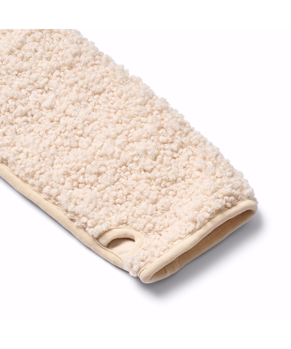 Ulan - Vanilla - Off-white fleece jacket for children made of recycled polyester with a nice back patch in durable nylon.