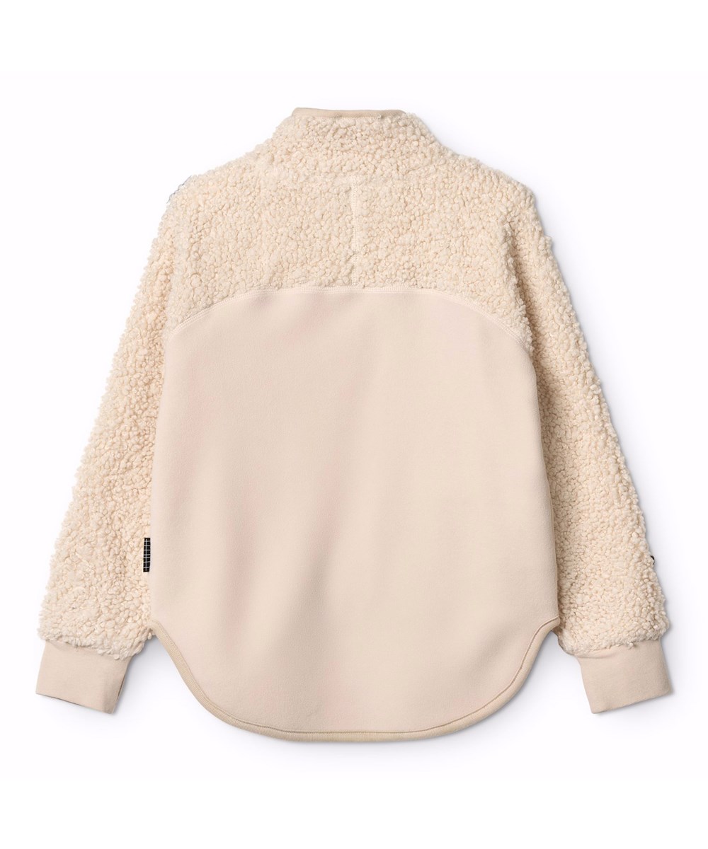 Ulani - Vanilla - Raw white fleece jacket for children in recycled polyester with matching ribbed edges and a front pocket.