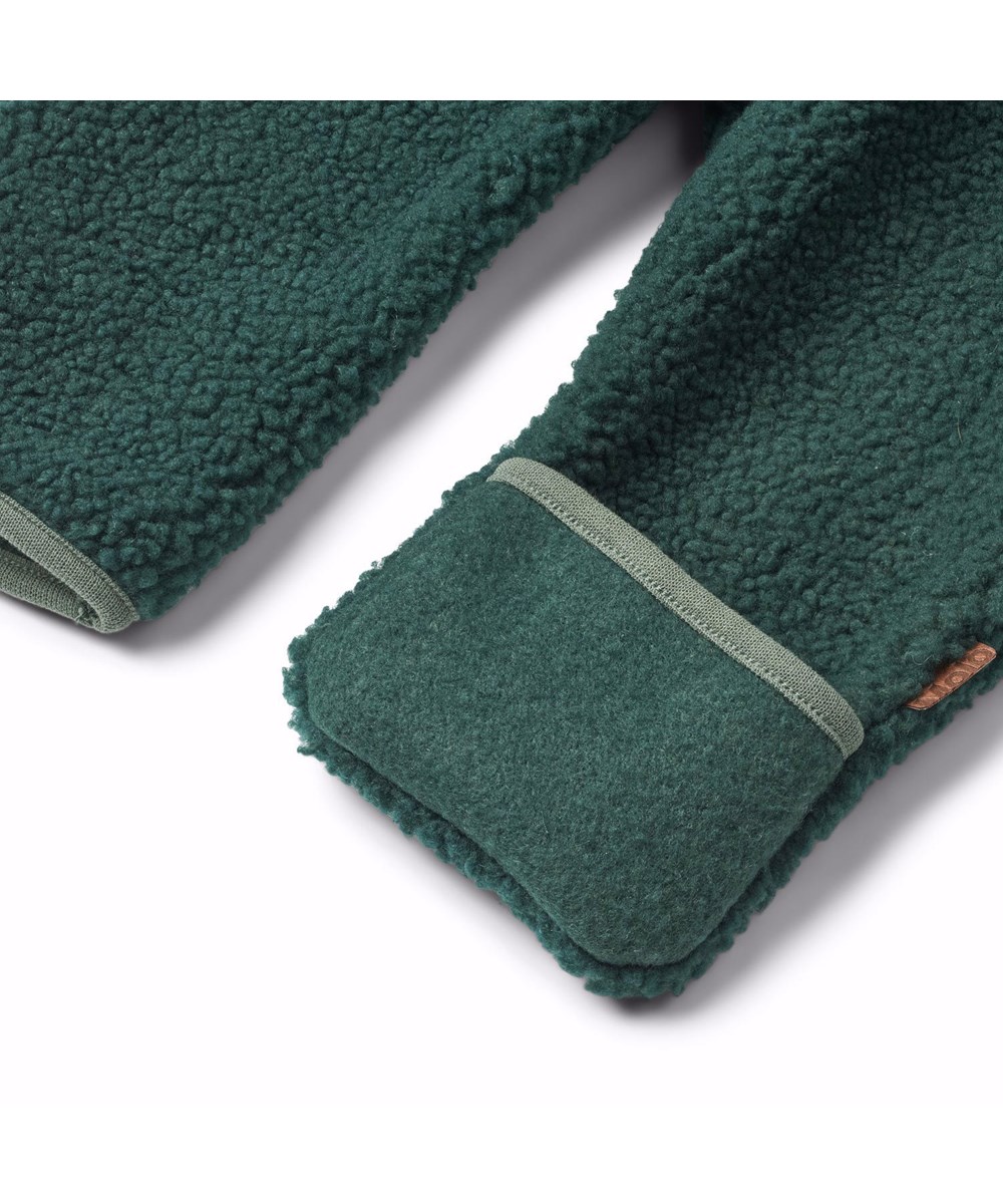 Umeko - Ponderosa Pine - Dark green fleece suit for babies and toddlers