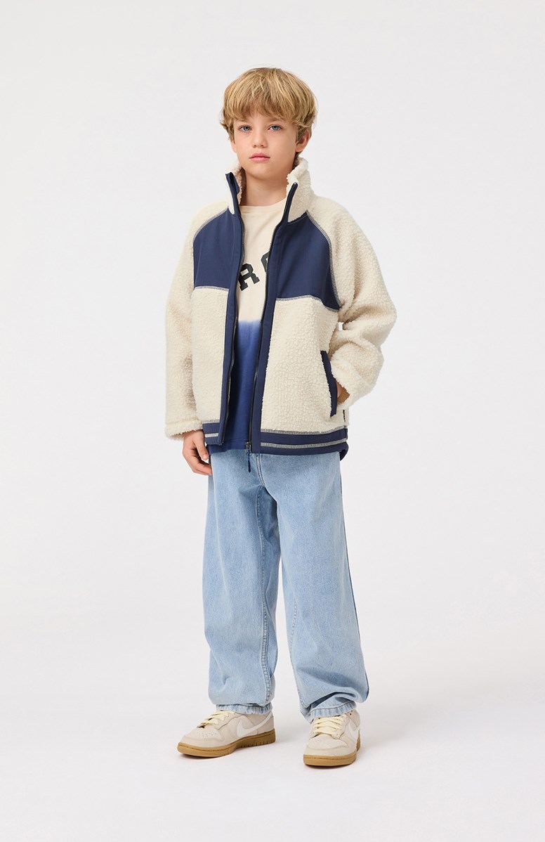 Usher - Summer Sand - Off-white fleece jacket for children in recycled polyester with front pockets and blue durable details.