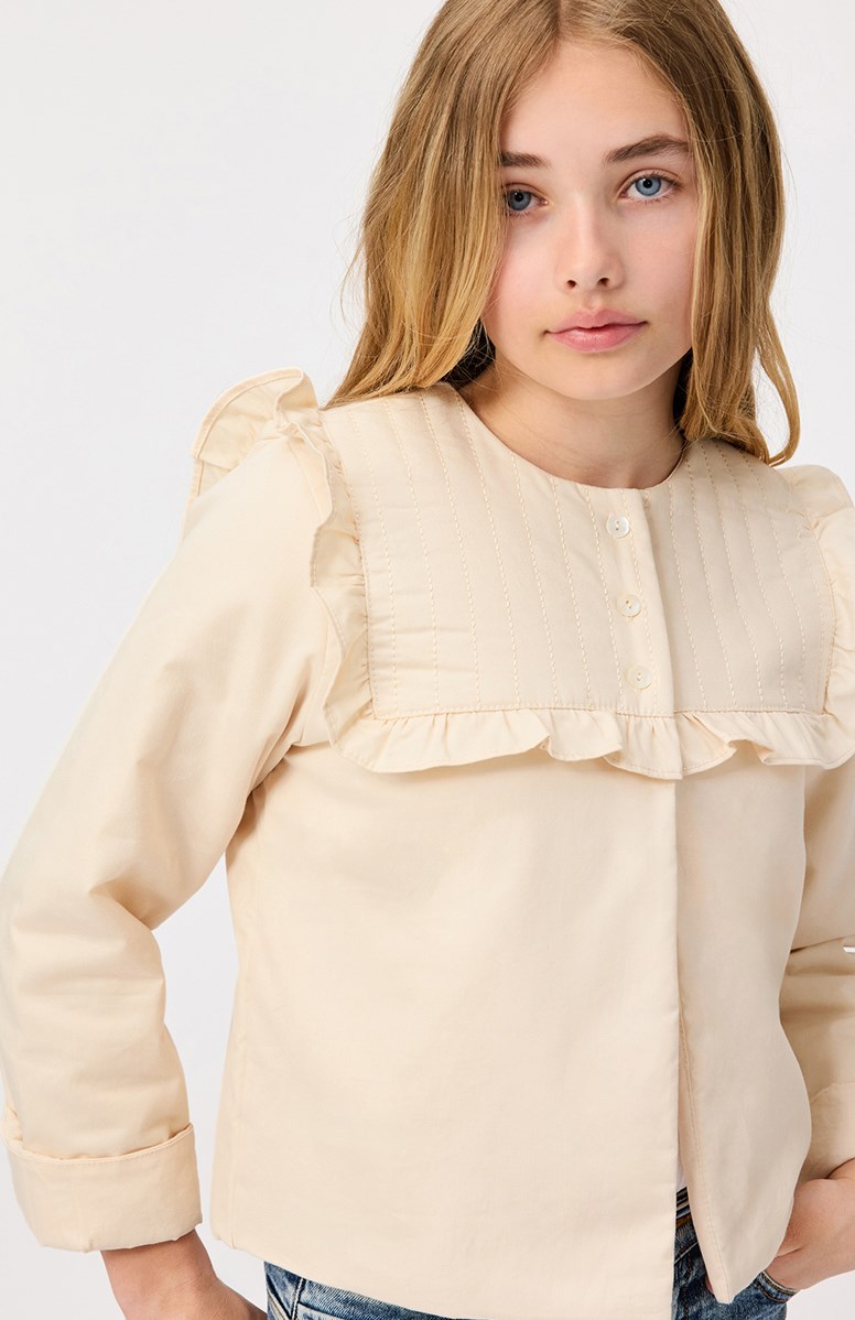 Haleen - Brazilian Sand - Beige padded jacket for children in soft cotton with ruffle edge.