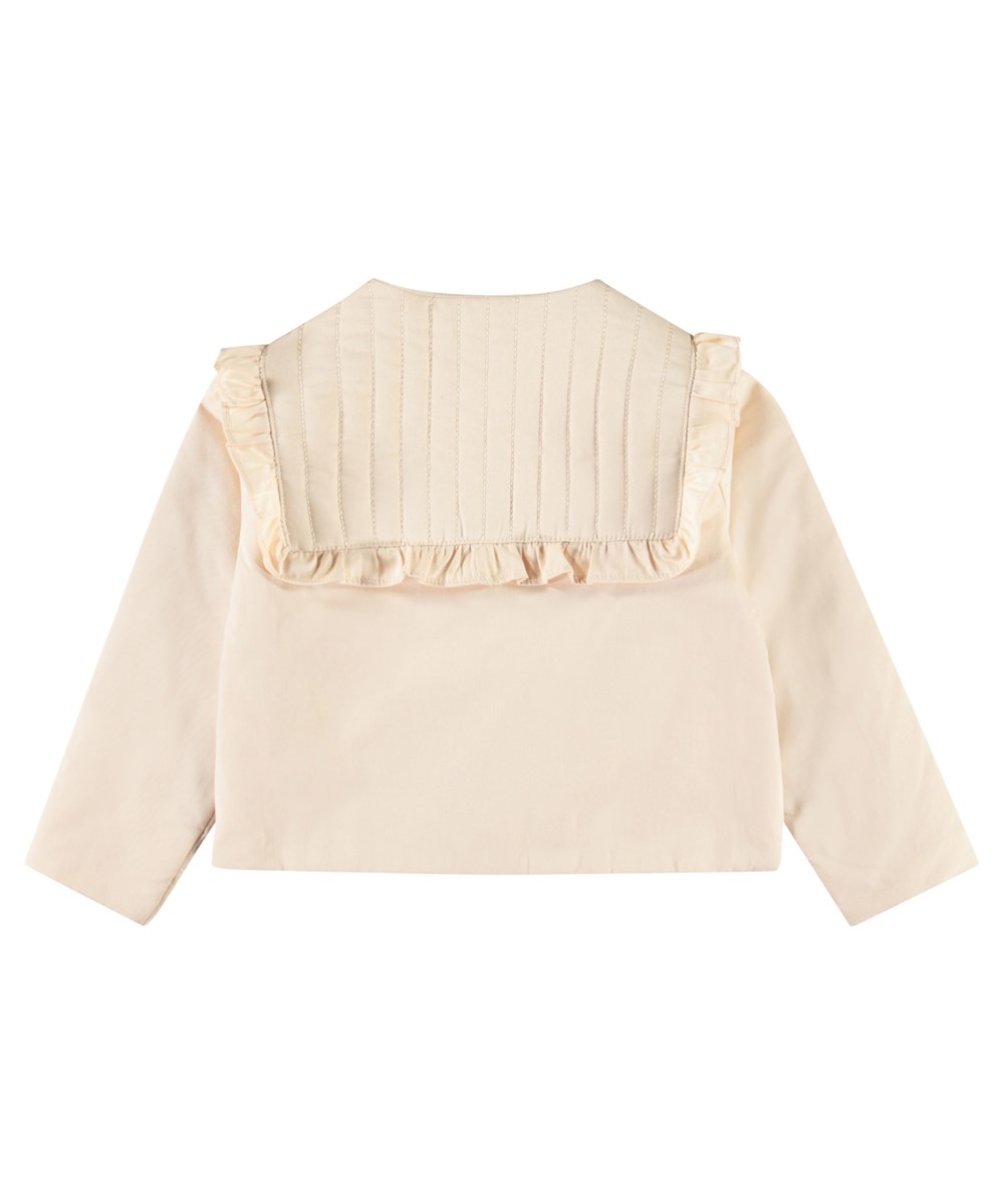 Haleen - Brazilian Sand - Beige padded jacket for children in soft cotton with ruffle edge.
