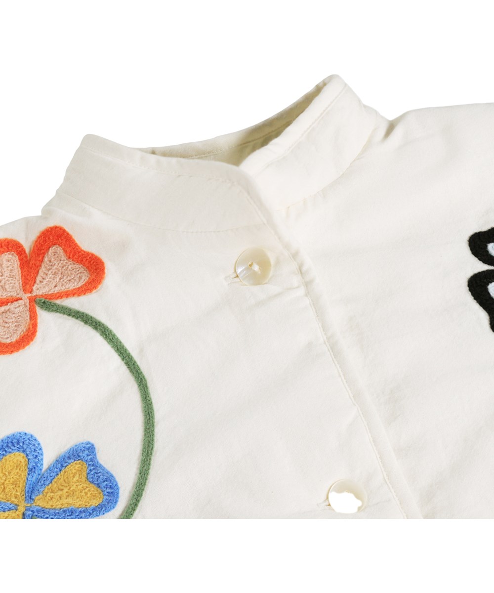 Harlow - Nature Life - White quilted jacket for children made of soft cotton with quilted lining and floral print.