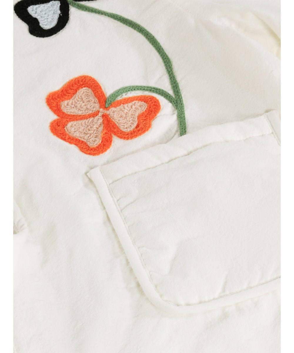 Harlow - Nature Life - White quilted jacket for children made of soft cotton with quilted lining and floral print.