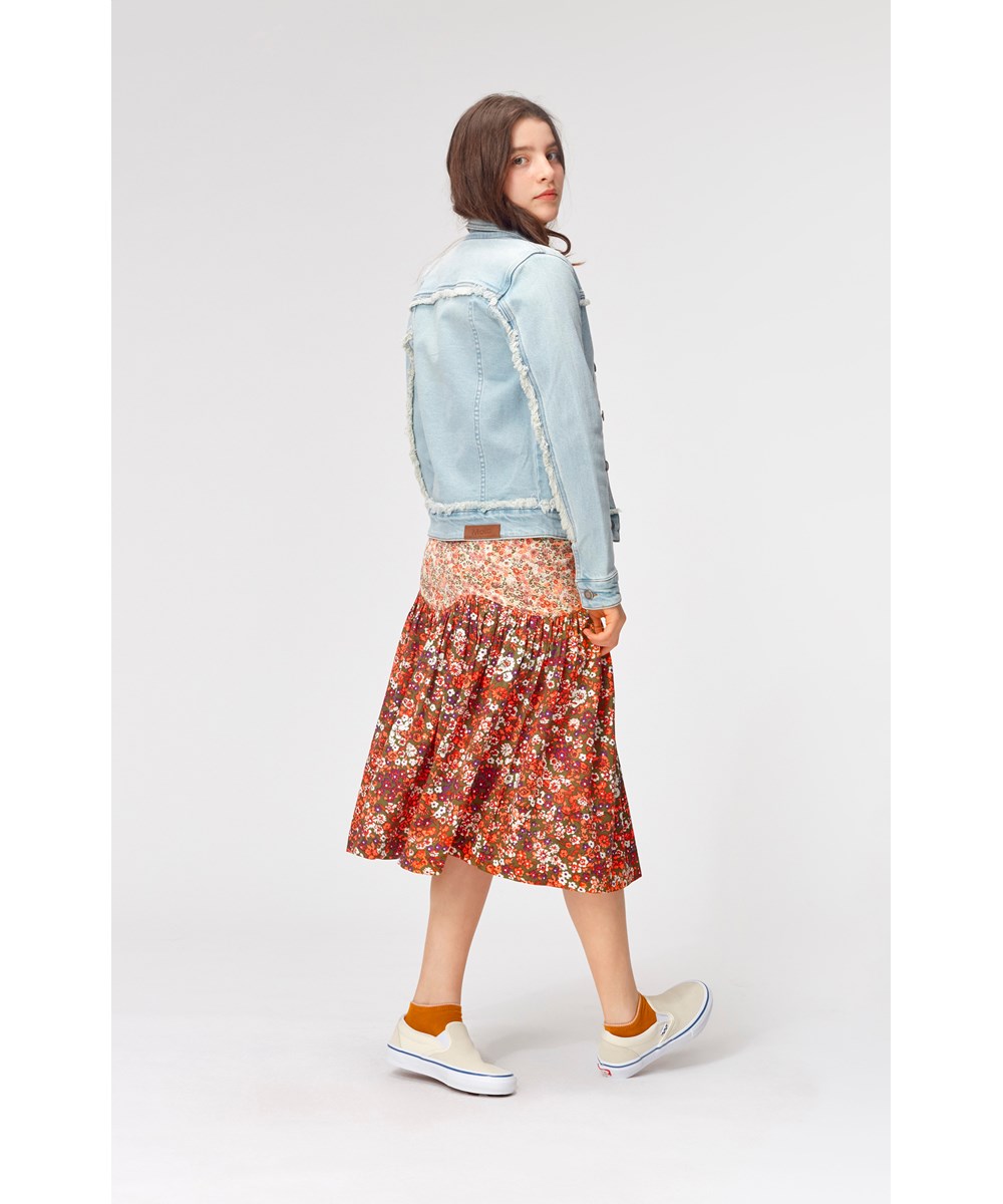 Hattie - Light Tinted Blue - Light blue denim jacket with fringe detail 