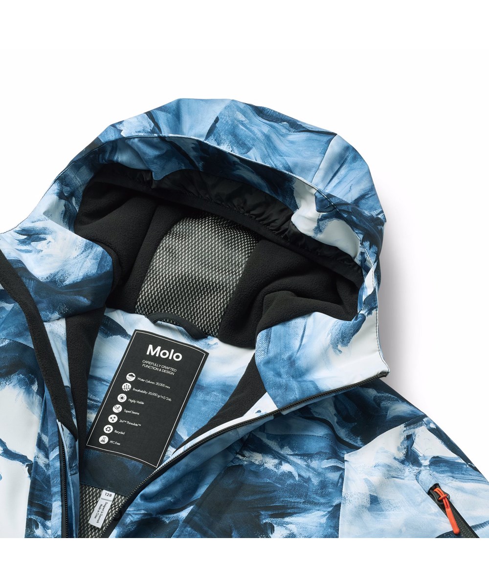 Alpine - Arty Mountains - Wind and waterproof blue and white winter jacket for children made of recycled polyester, padded with 3M™ Thinsulate™.