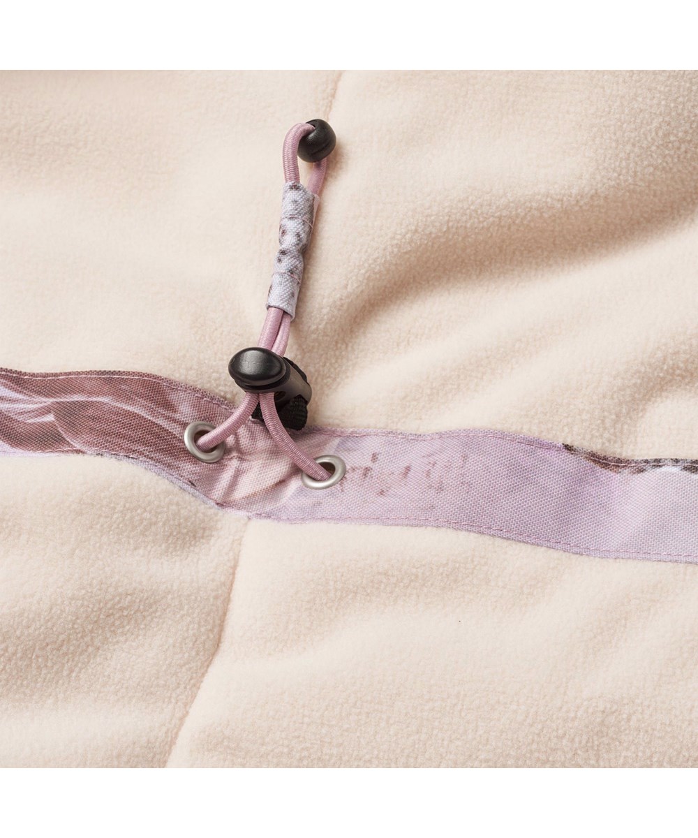 Cathy Fur - Dreamy Horses - Wind- and waterproof winter jacket for children in recycled polyester with a print of horses on a dreamy background in shades of pink and purple.