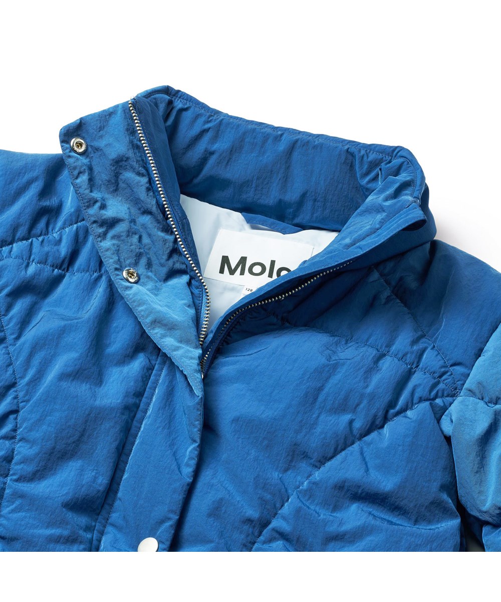 Halima - Lapis Blue - Water-repellent blue jacket for children in recycled nylon.