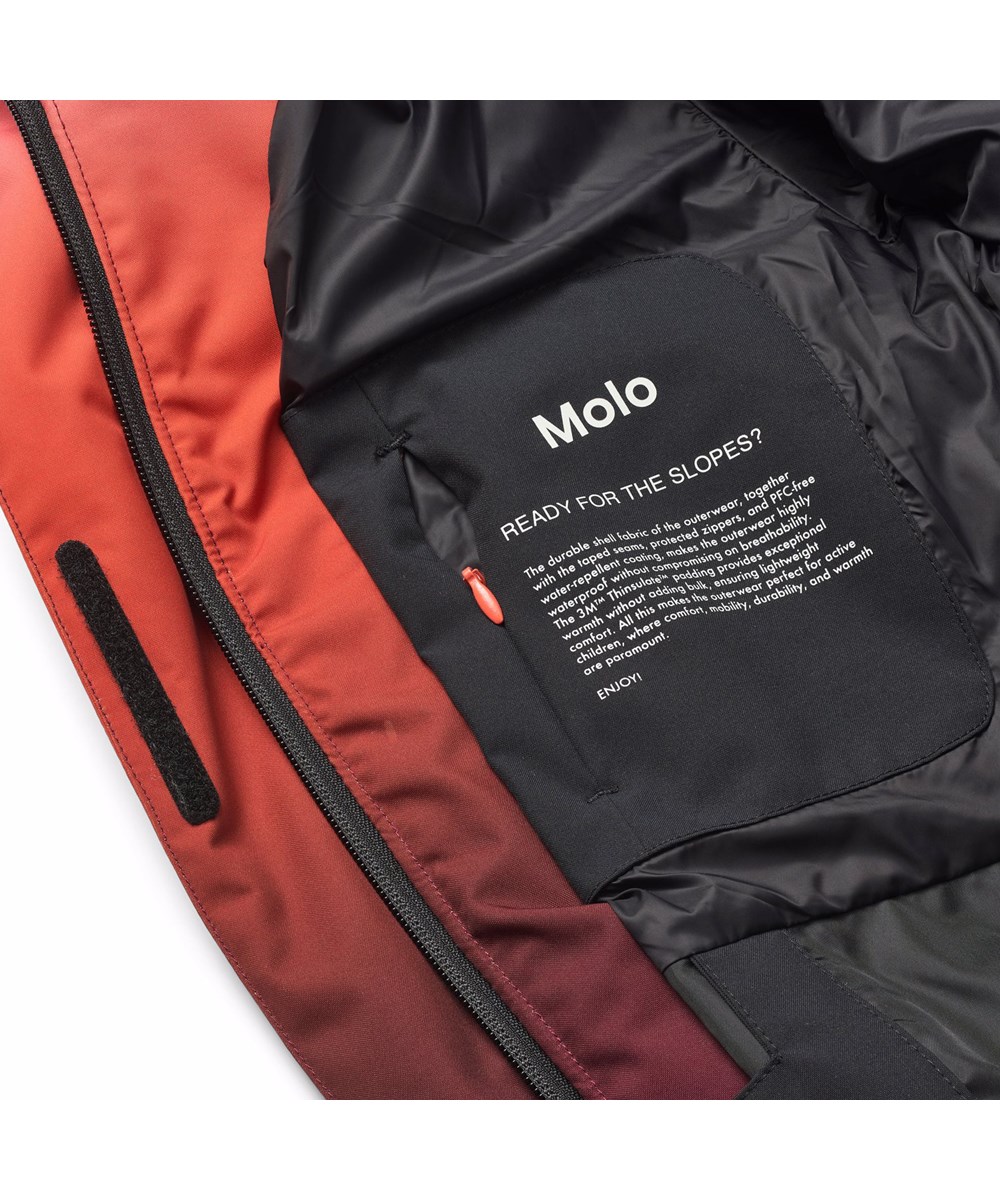 Hansine Pro - Fiery Red - Wind and water repellent pink and red winter jacket for children in recycled polyester with recycled polyester filling and 3M™ Thinsulate™.