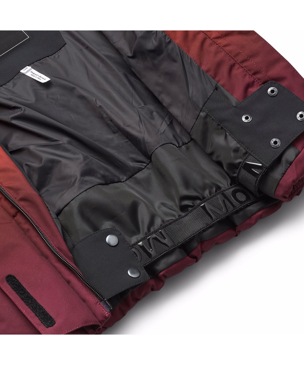 Hansine Pro - Fiery Red - Wind and water repellent pink and red winter jacket for children in recycled polyester with recycled polyester filling and 3M™ Thinsulate™.