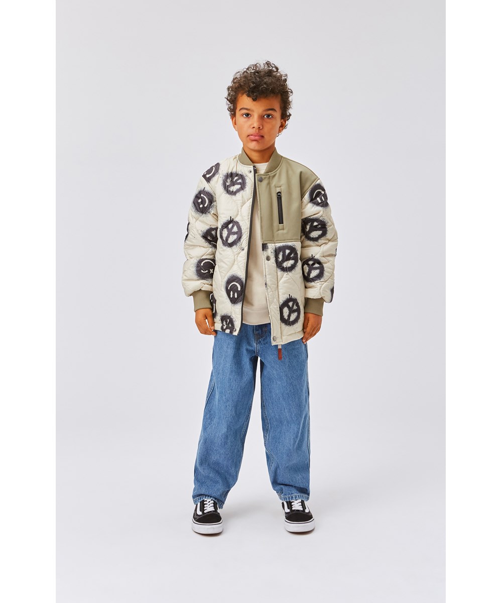 Harold - Happy Rock - Beige quilted jacket with a peace sign print 