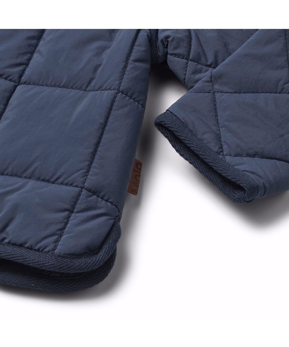 Harrie - Mood Blue - Dark blue water-resistant thermal jacket for children in recycled nylon with quilted pattern.