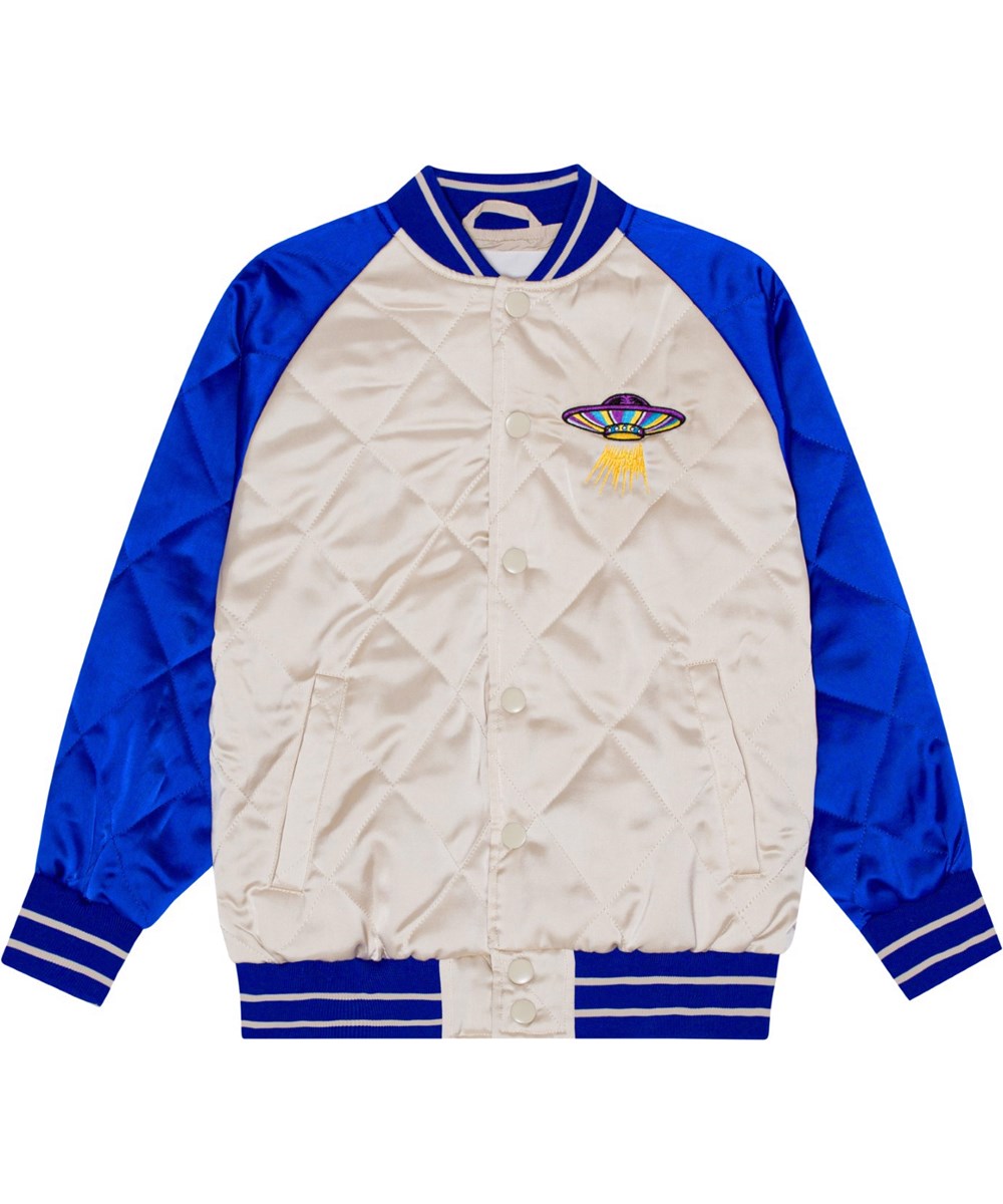 Haru - Summer Sand - Quilted bomber jacket in blue and off-white with a large embroidered patch of a UFO, a dinosaur and fire on the back