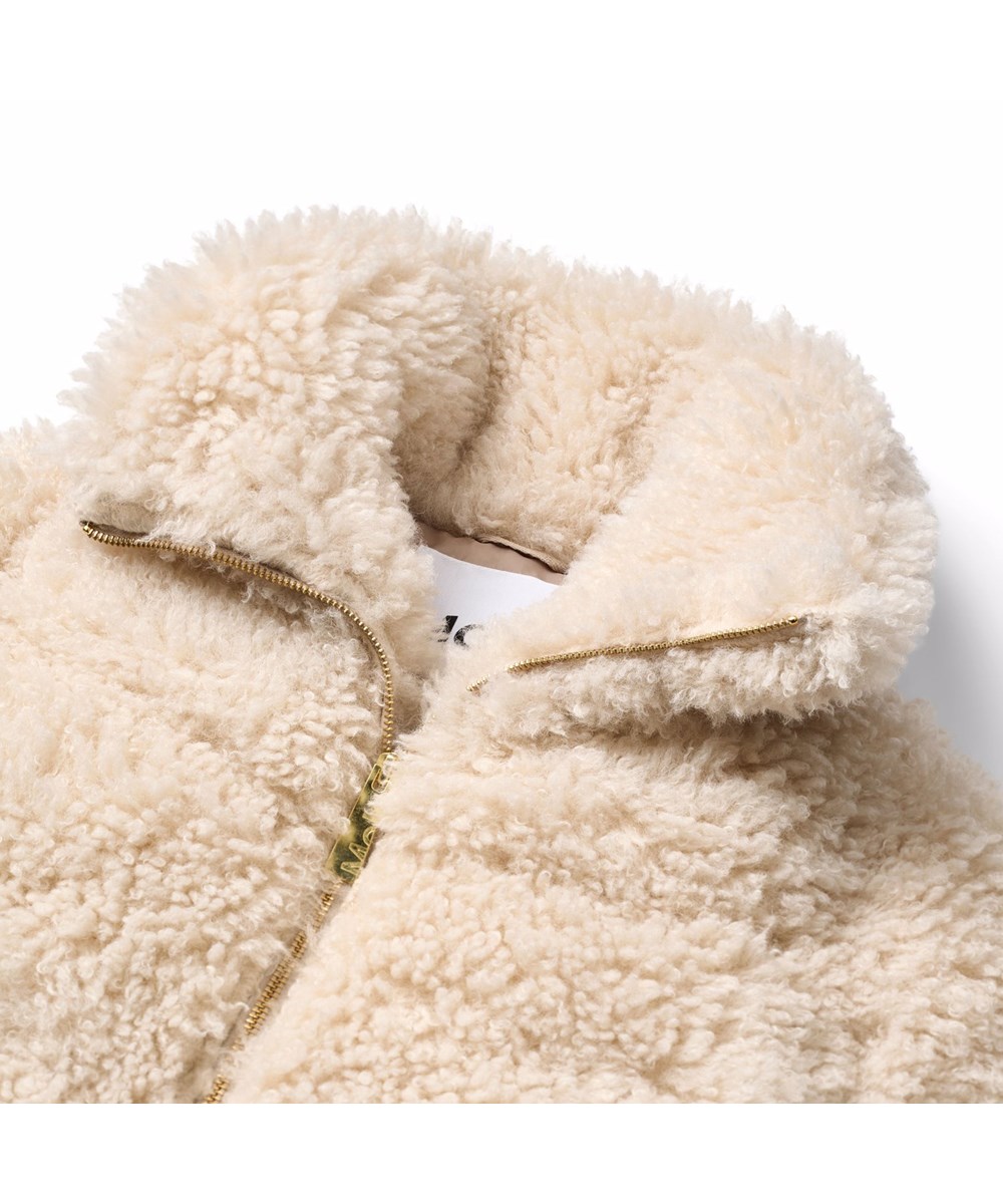 Havi - Vanilla - Off-white faux fur jacket for children in shearling-look made from recycled polyester.