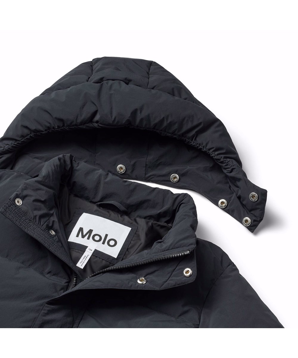 Hayden - Black - Water-repellent black jacket for children in recycled nylon.