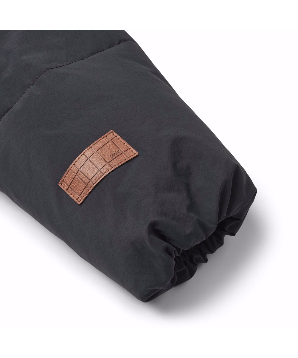 Hayden - Black - Water-repellent black jacket for children in recycled nylon.