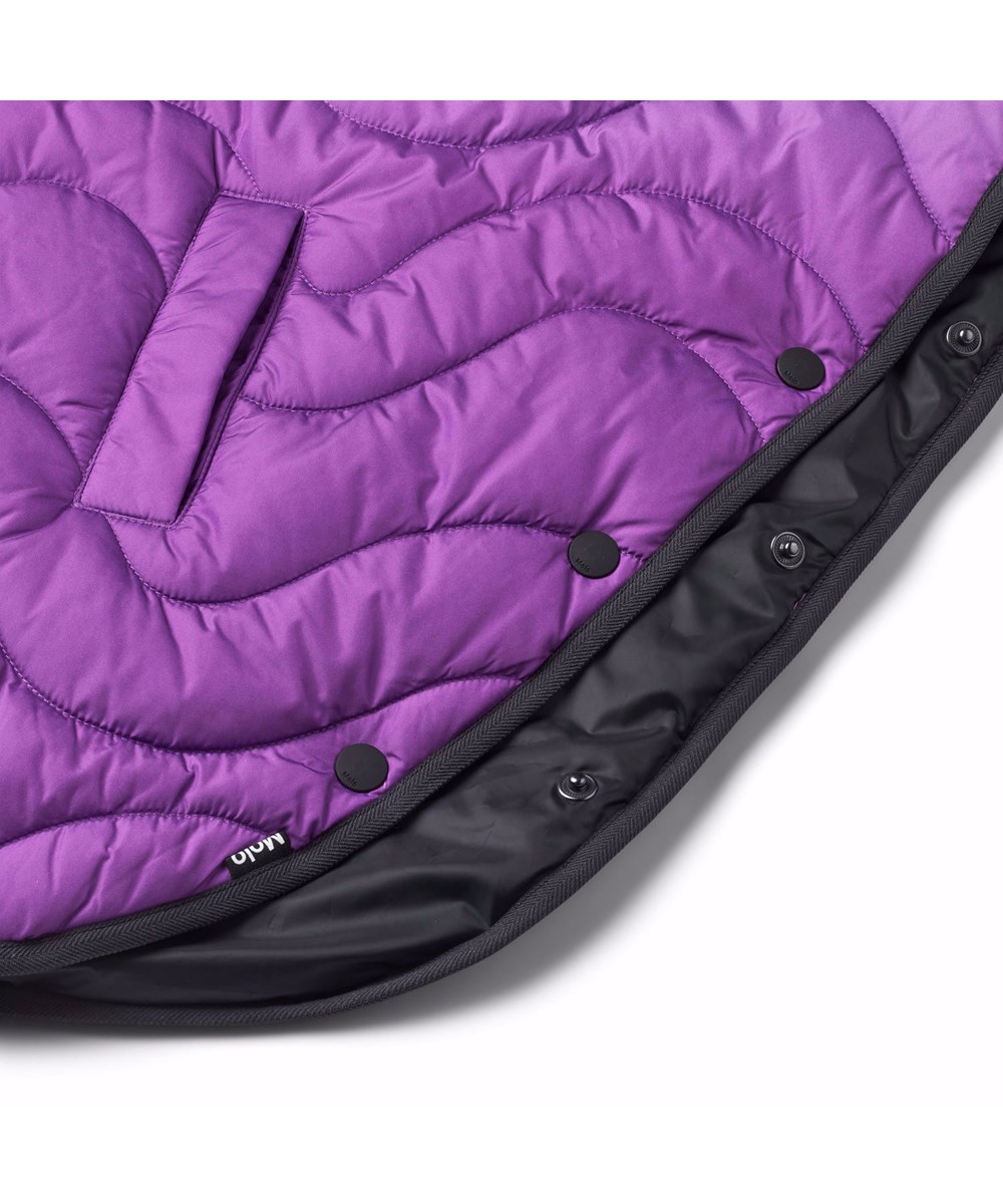 Haylee - Warm Purple - Water-repellent poncho for children in purple gradient colours.