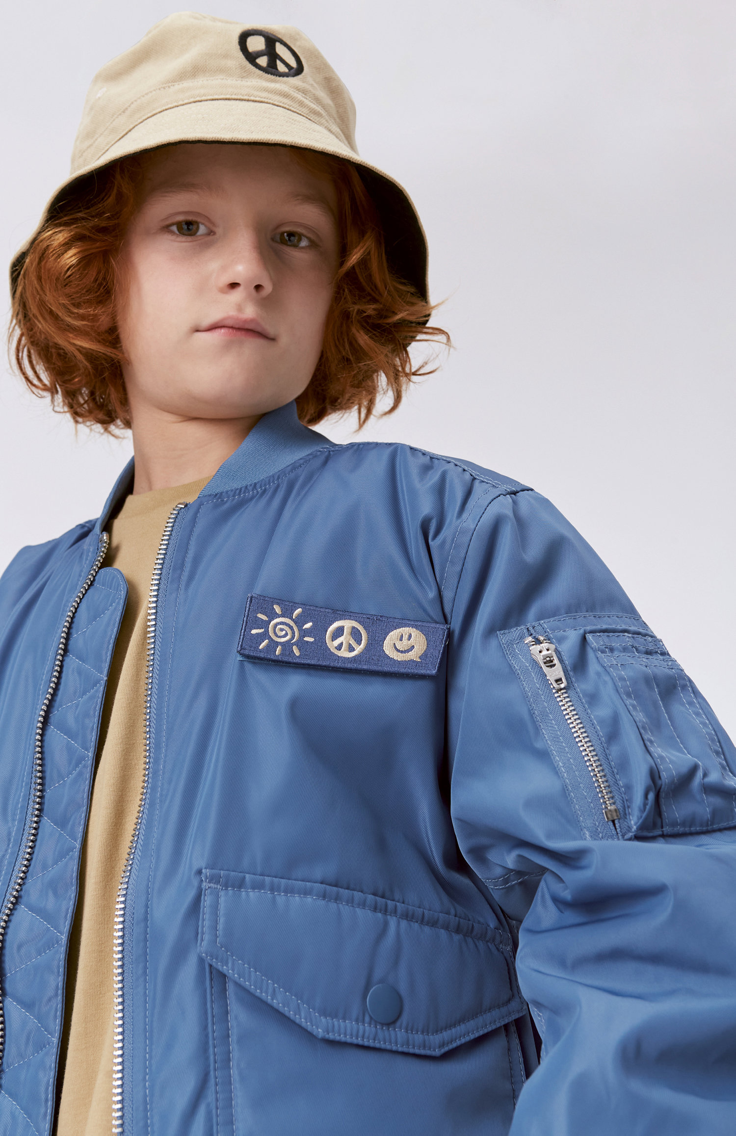 Heath - Moonlight Blue - Blue bomber jacket with sun, peace and 