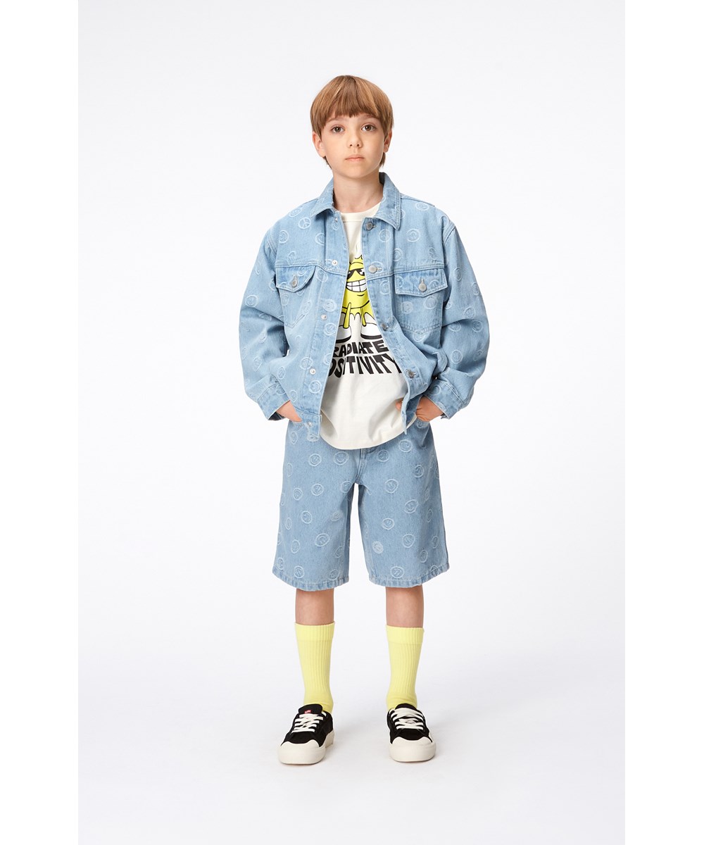 Hedly - Happiness Light - Light blue denim, children's jacket with smiling face and peace sign print