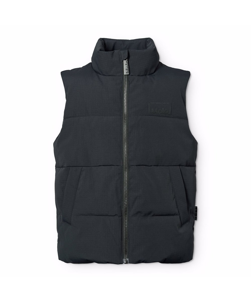 Heike - Black - Black puffer vest for children in recycled nylon with a front zip, high collar and large armholes, allowing for a jacket or thick sweater to be worn underneath.