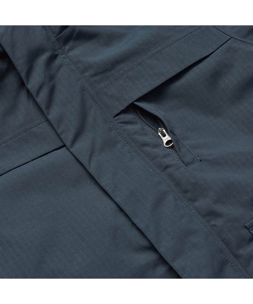 Heiko - Night Navy - Wind- and water-repellent dark blue jacket for children in recycled nylon with practical zip closure, high collar, and detachable lined hood.