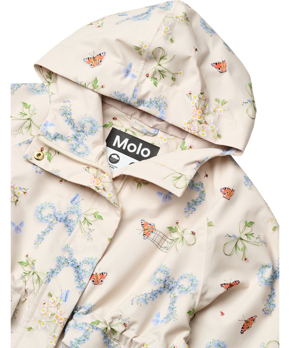 Hennah - Floral Bows - Off-white wind- and waterproof jacket for children made from recycled polyester with a butterfly print.