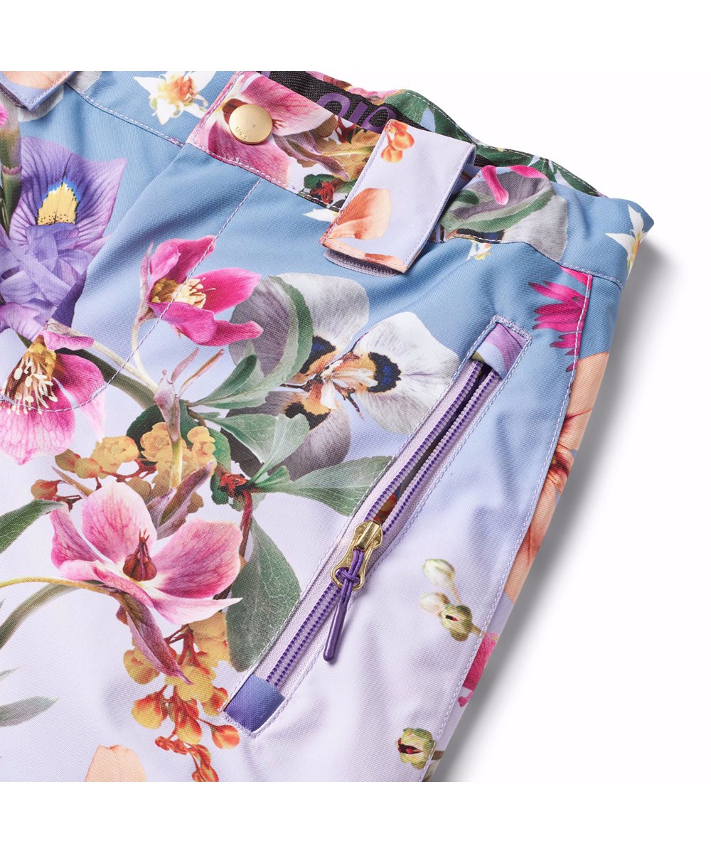 Jump Pro - Gradient Bloom - Wind- and waterproof trousers for children in recycled polyester with a floral print.