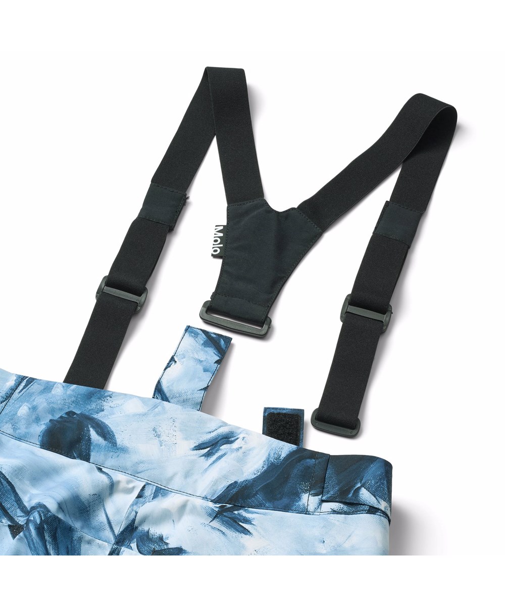 Jump Pro - Arty Mountains - Wind and waterproof ski pants for children with an artistic print of the Alps and snowboarders in blue and white shades. It is made of recycled polyester and padded with 3M™ Thinsulate™.