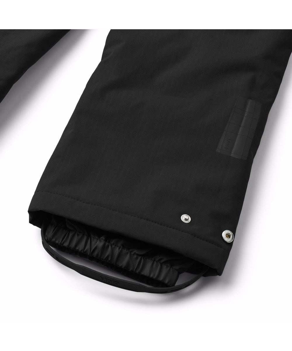 Paxton - Black - Black blue wind and waterproof trousers for children made of recycled nylon with adjustable an waist.