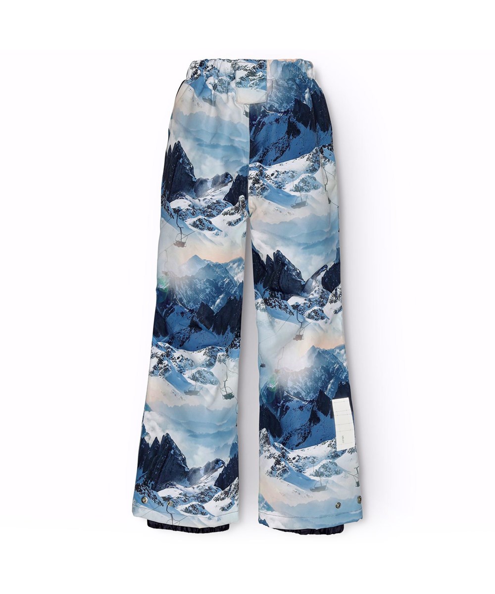 Paxton - Mountain High - Wind- and waterproof snow pants for children made from recycled polyester with a winter landscape print in shades of blue.