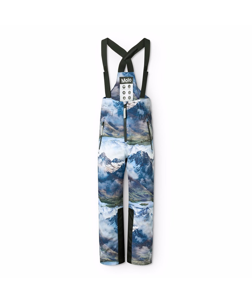 Play Pro - Snowy Mountains - Wind and waterproof ski pants made of recycled polyester with a beautiful landscape print showing snow-capped mountain peaks in vivid colours. The ski pants have adjustable braces and are padded with 3M™ Thinsulate™.