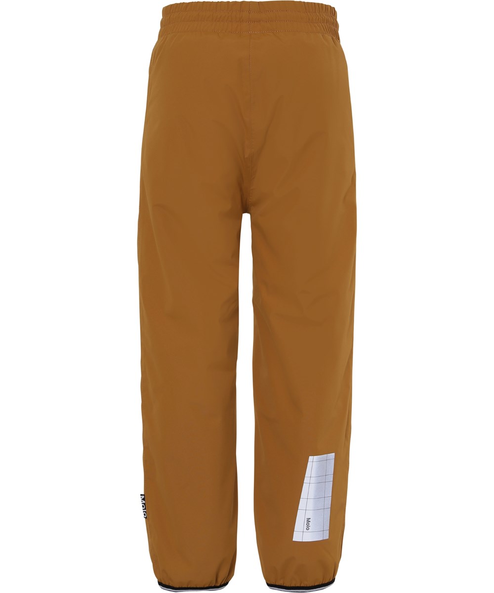 Wild - Autumn Leaf - Lined rain trousers in a mustard colour