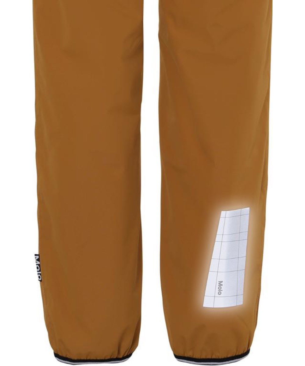 Wild - Autumn Leaf - Lined rain trousers in a mustard colour