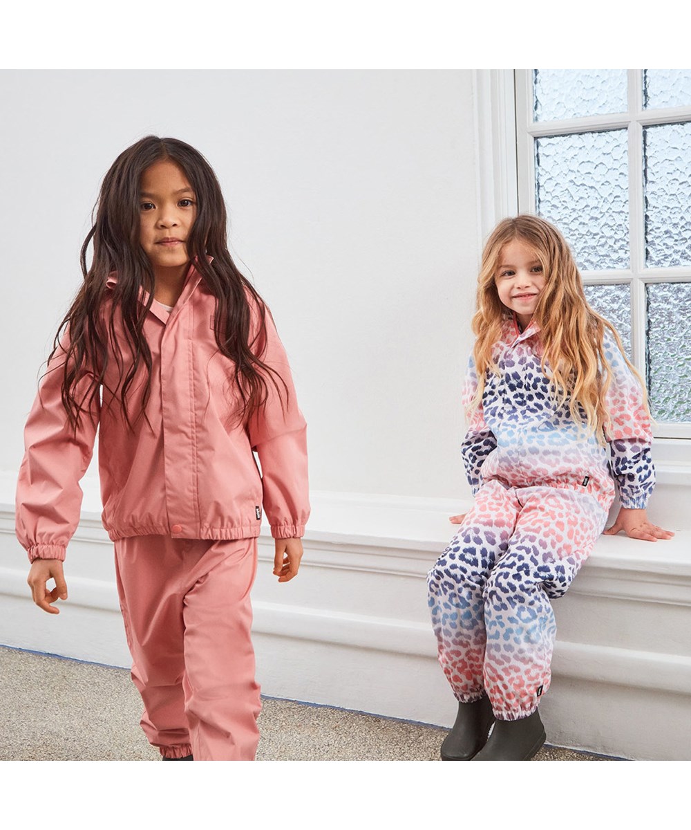 Waits - Jaguar Stripe - Lightweight and breathable rain trousers in multi-coloured animal print