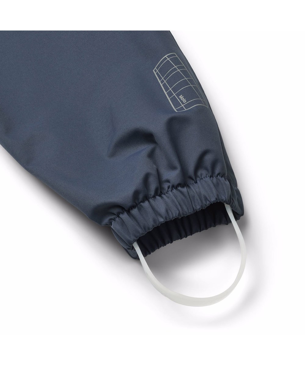 Waits - Mood Blue - Dark blue wind and waterproof rain trousers for children in durable and recycled polyester.