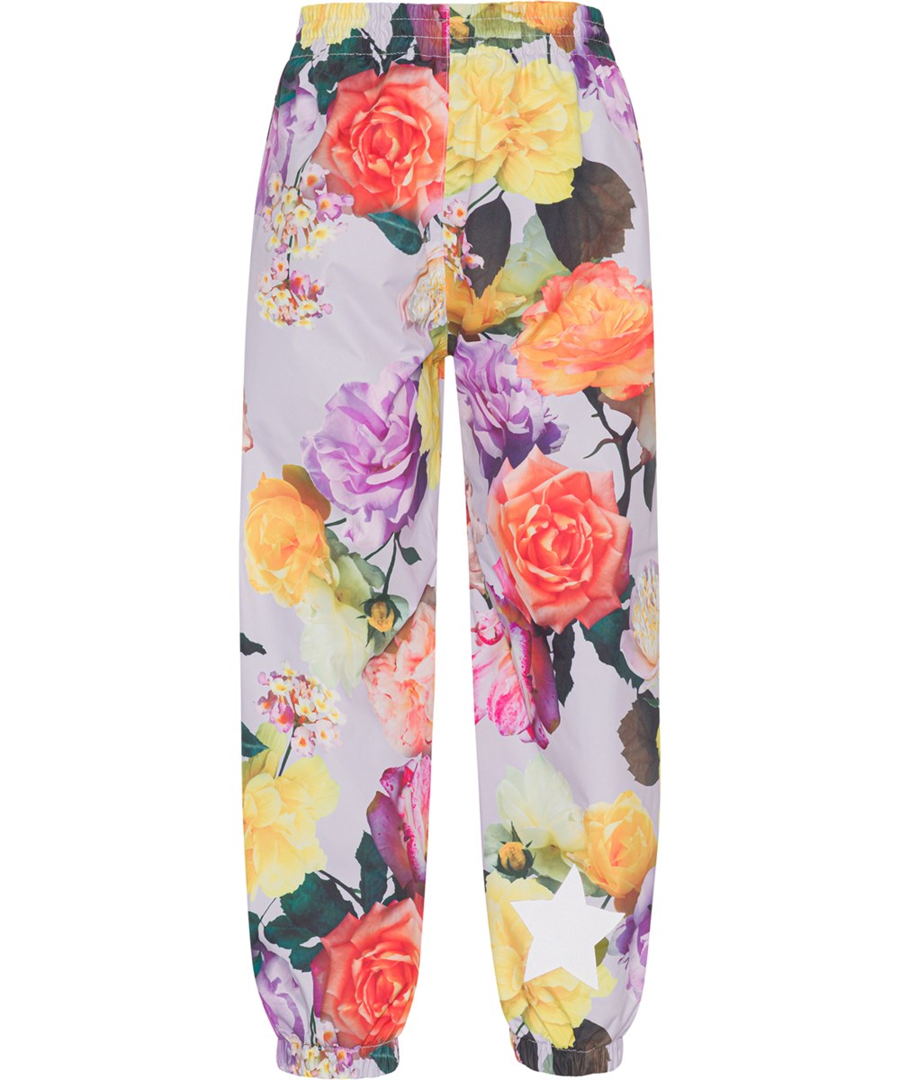 Waits - Rose Park Pink - Rain trousers in light purple with large floral print