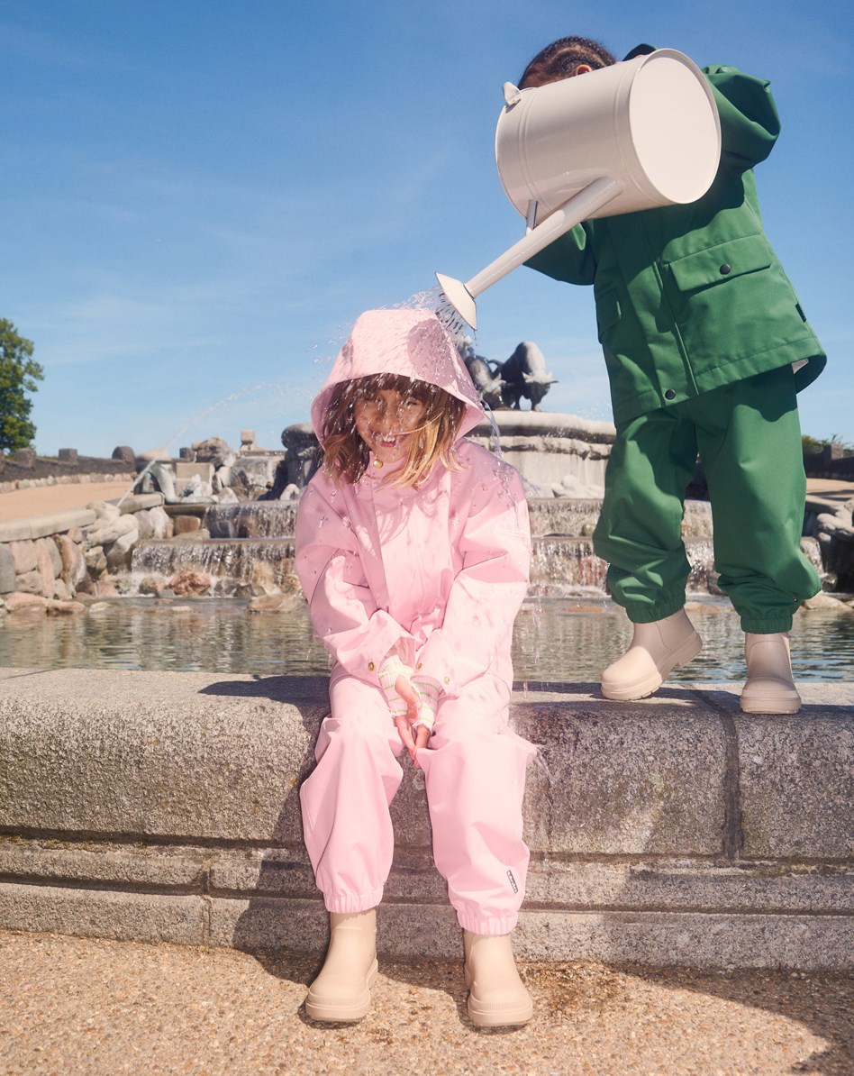 Waits - Rosequartz - Pink wind and waterproof rain trousers for children in durable and recycled polyester.