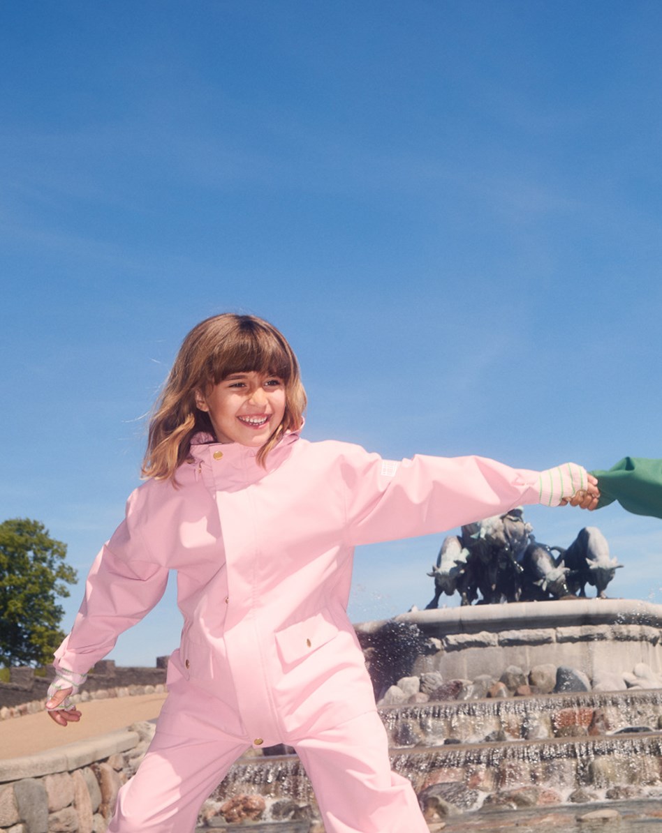 Waits - Rosequartz - Pink wind and waterproof rain trousers for children in durable and recycled polyester.