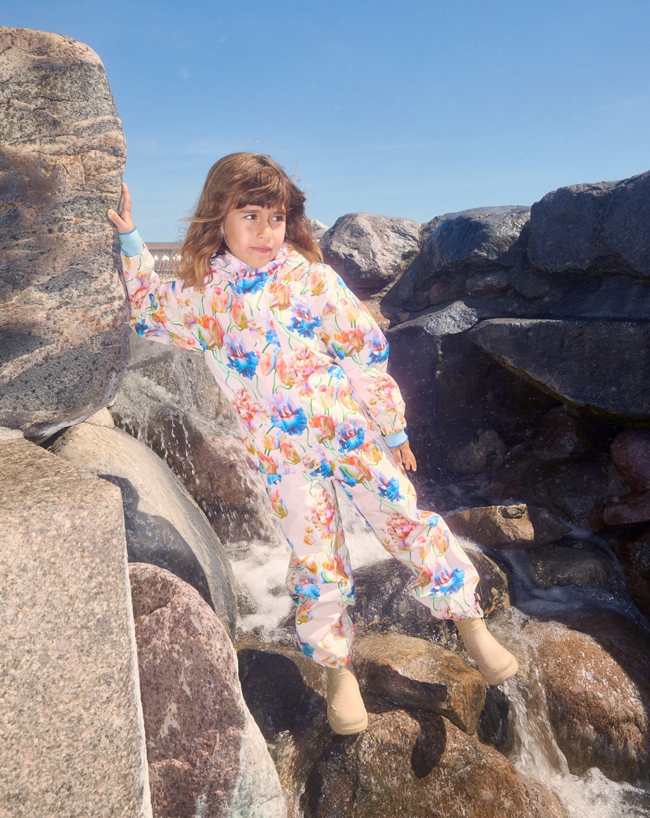 Waits - Tulip Pink - Light blue wind and waterproof rain trousers for children in durable and recycled polyester.