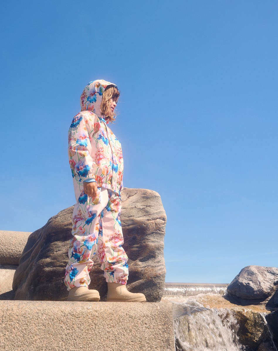Waits - Tulip Pink - Light blue wind and waterproof rain trousers for children in durable and recycled polyester.