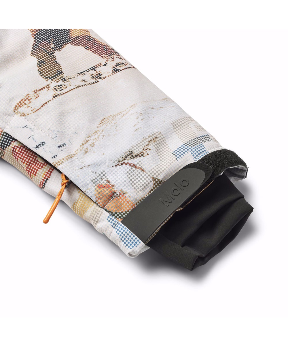 Hux - Spin 1260 - Children's snowsuit in recycled polyester with a pixel print of a cool snowboarder in the Alps.